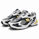 کفش کتانی مردانه نیوبالانس 725 مستر کوالیتی طرح سپهر New Balance 725 سفید سورمه ای زرد